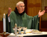 Fr. Jeremy, 85, Associate Pastor at Church of Transfiguration, Southfield, MI, presiding at Mass.