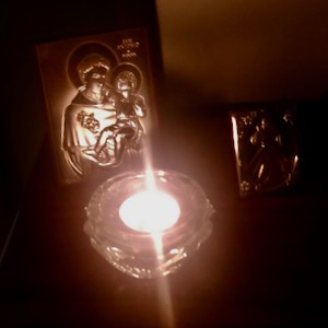 candle and St. Anthony plaque