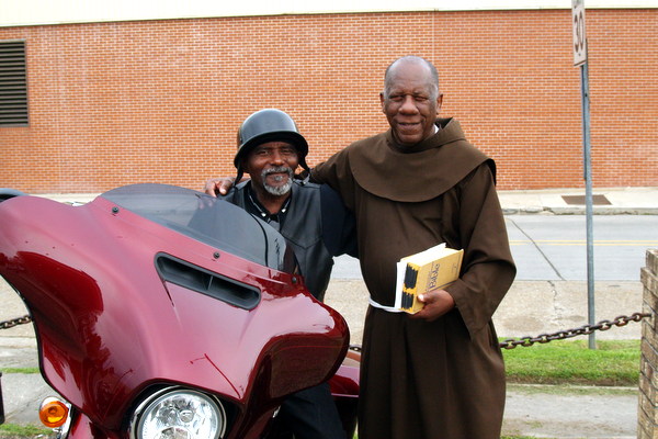 Fr. Bob Seay, OFM, with St. Paul parishioner Harold Thibeau for an afternoon of fellowship and food and blessings with other bikers from around the country.