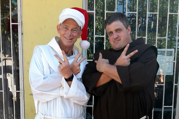 Fr. Jim Bok and Fr. Colin King at the St. Anthony's Kitchen Christmas Party