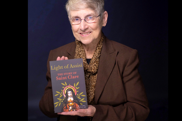 woman holding book