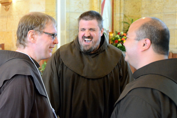 Br. Michael Charron enjoys a good laugh with fellow friars Br. Colin King and Fr. Roger Lopez