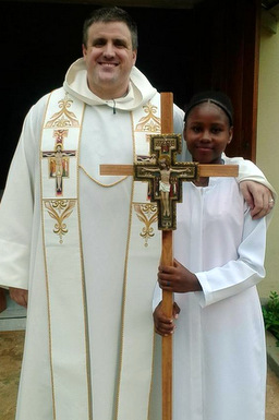 Fr. Colin with Avaree, the newest altar server at St. Mary's 