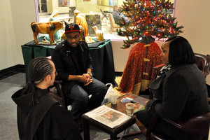 Br. Michael Radomski, OFM, chats with a couple.