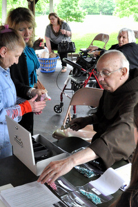 Br. Dominic sells St. Anthony Chaplets at the Feast of St. Anthony