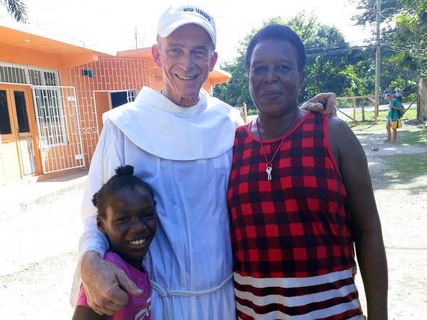 Friar with mother and daughter