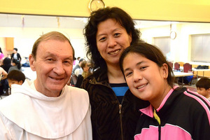 Fr. Joe Hund with parishioners