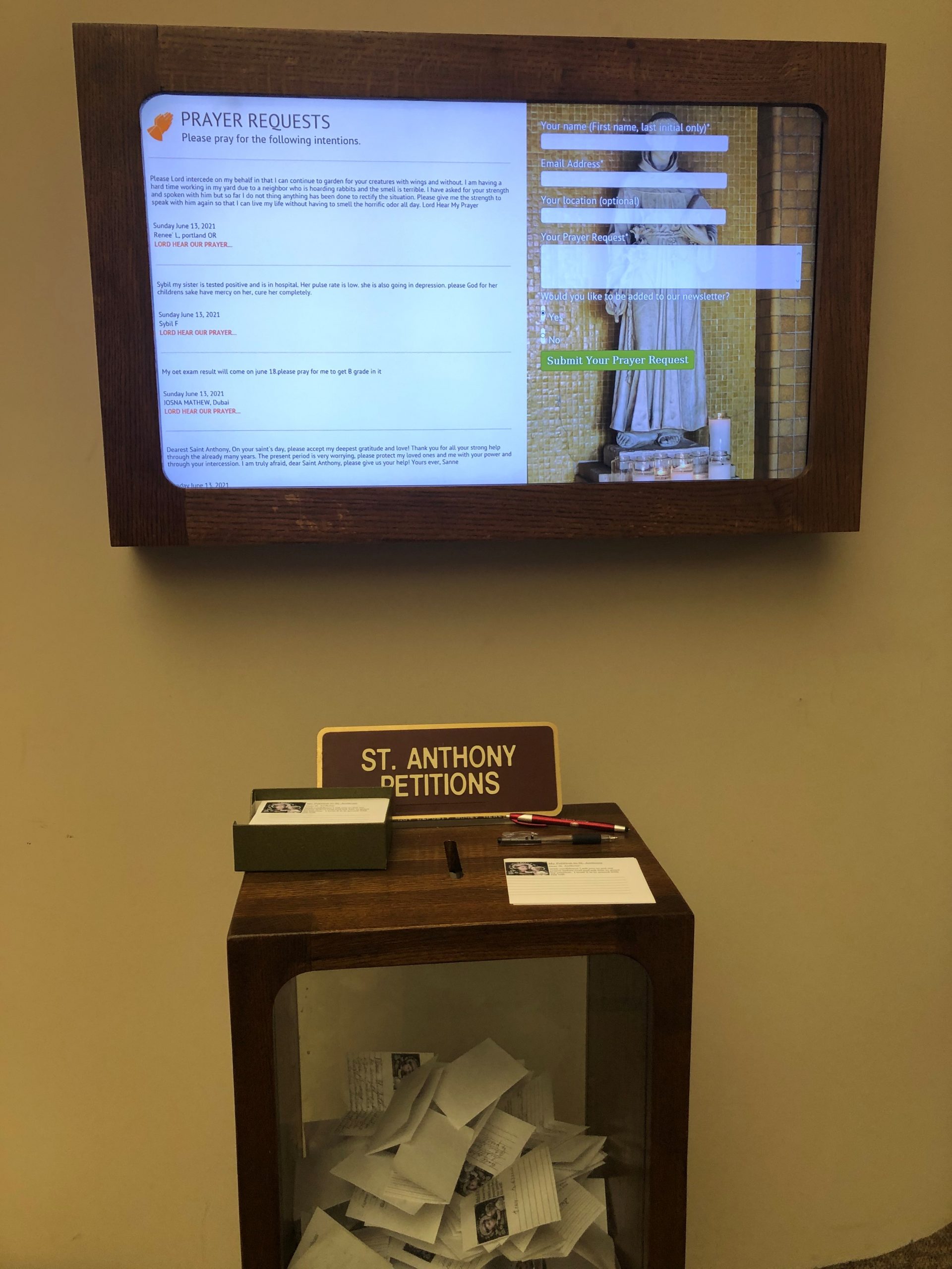 Scrolling monitor with keyboard for prayer requests at the Shrine