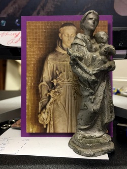 St Anthony card and statue