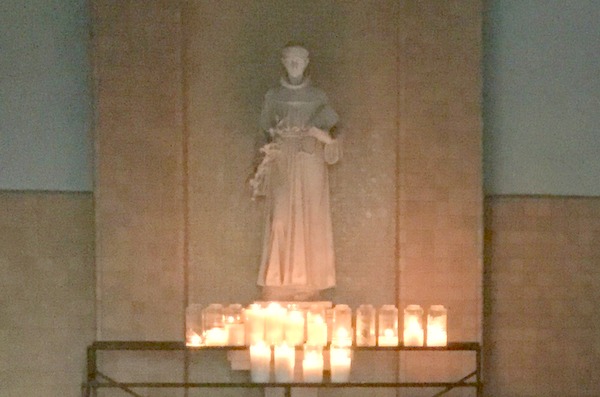 St. Anthony statue and candles