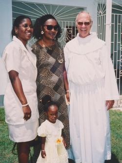 friar with parishioners