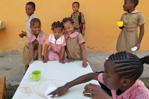 children clean-up breakfast