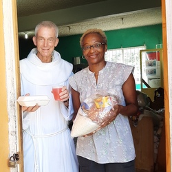 friar and woman in doorway