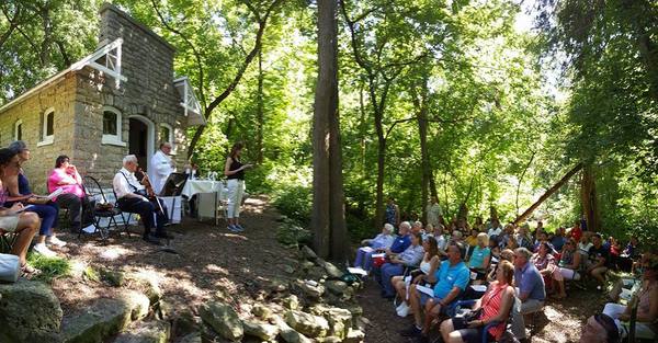 Mass in the woods outside St. Anthony Chapel