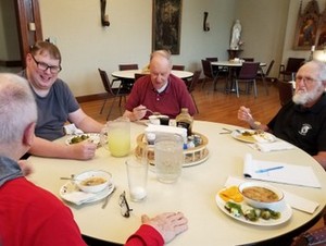 Friars eating lunch