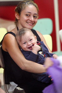 A tired but happy mom and her son.