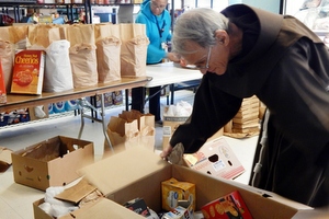 Br. Louie at the food pantry