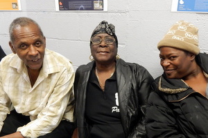 Food pantry helper Ron Nunn with Pauline Ford & Damita Brooks