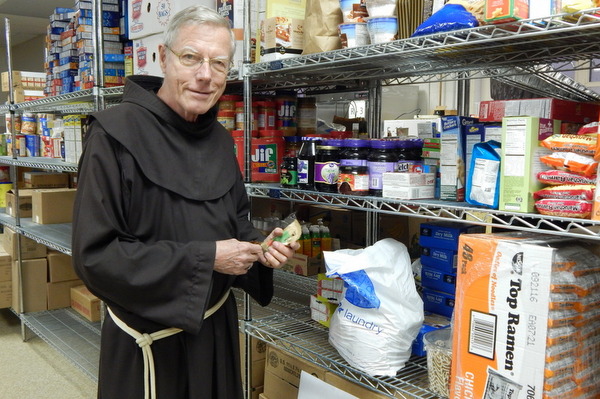 friar in with shelves of food