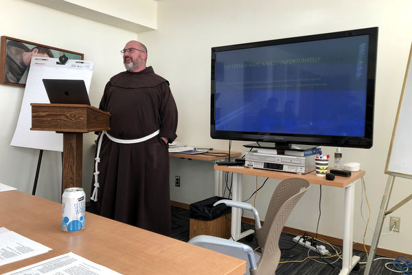 friar in classroom