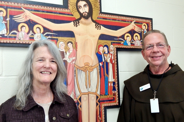 Sr. Ann Marie and Br. David by San Damiano cross