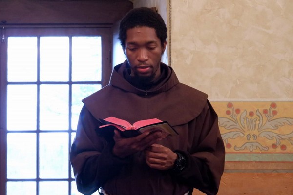 Friar reading book