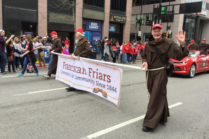 Friars walk in the Reds parade