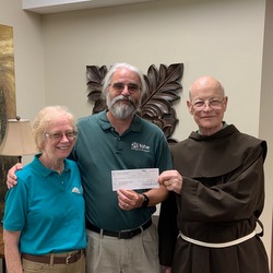 friar giving check