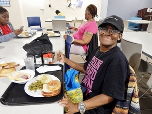 Guest with dinner tray