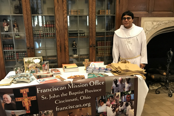 Fr. Saleem Amir, OFM, at SJB's information table for a Missionary Conference held in Cincinnati, Ohio