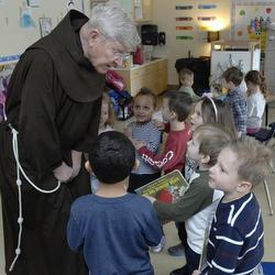 Fr. Ric talking with students