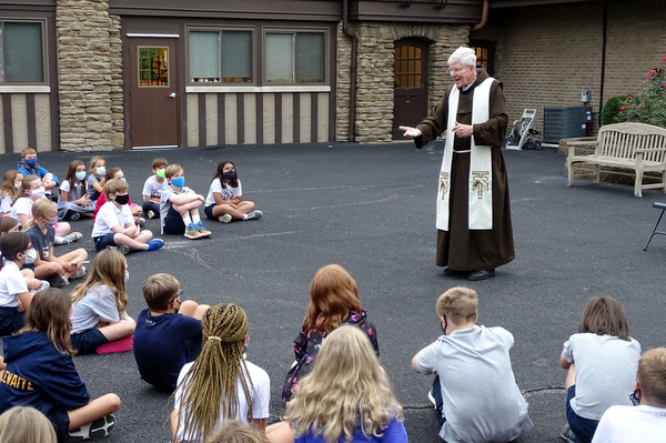 friar and students