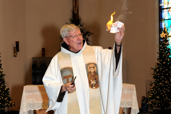 Fr. Ric burning paper