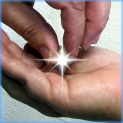 man placing diamond ring into woman's hand