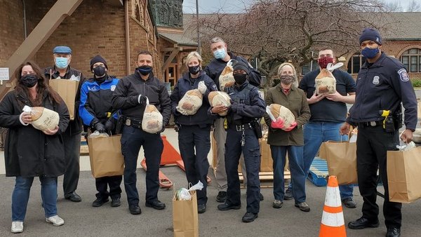 police with bags of food