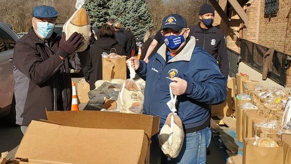 men with food bags