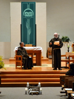 2 friars at altar