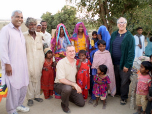 Custos Yusuf Bagh (far left) with Br. vince Delorenzo (far right) and Fr. Alex Kratz (kneeling) with parishioners in Karachi, Pakistan.