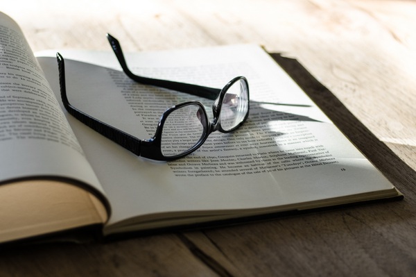 glasses on book