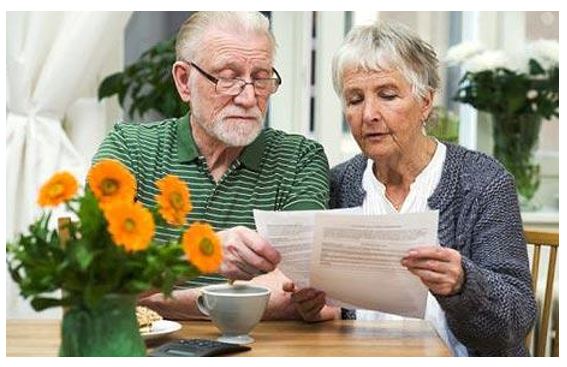 couple looking at paperwork