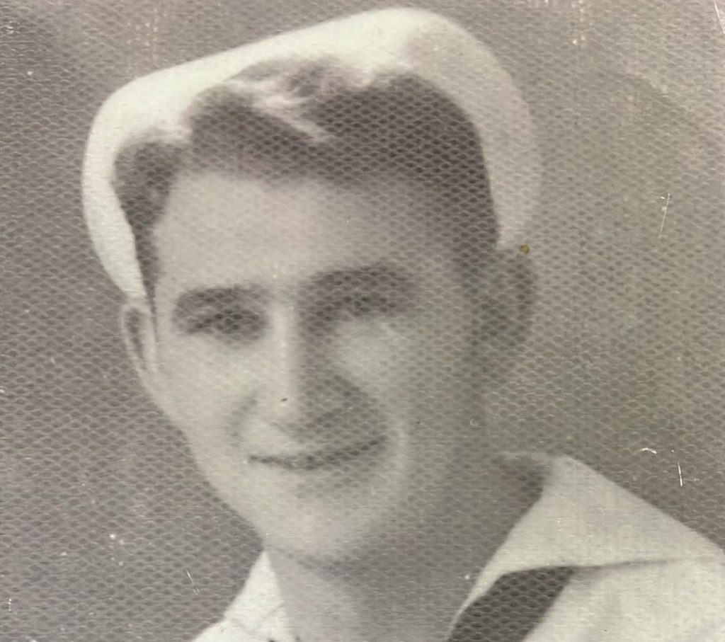 headshot of Debbie's father in his Navy uniform