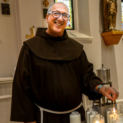 Friar in chapel